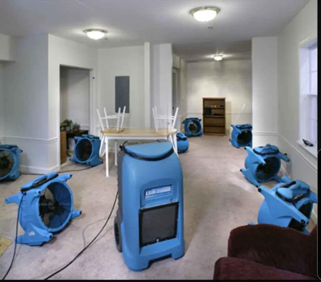 Air movers and dehumidifier setup for Water Damage Restoration in Brockton